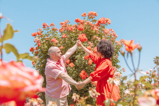 Couple in rose garden