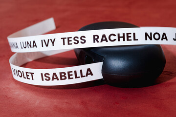 baby girl names printed on a white ribbon