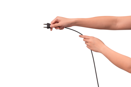 Close-up of hand holding a black electric power cord plug isolated on transparent PNG.