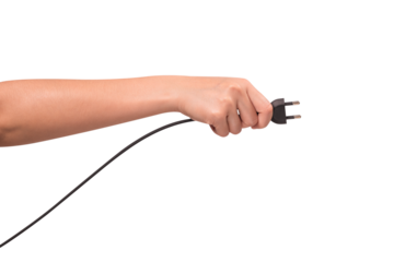 Close-up of a hand holding a black electric power cord plug isolated on transparent PNG.