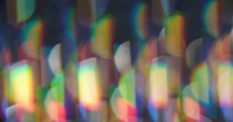 Blur circles. Lens flare. Defocused green orange neon colorful round rainbow texture glimmer optical on art abstract bokeh background.