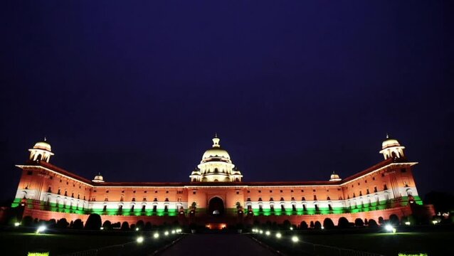 Rashtrapati Bhavan under tricolor lights, dramatic wide-angle shot, steady cinematic camera
