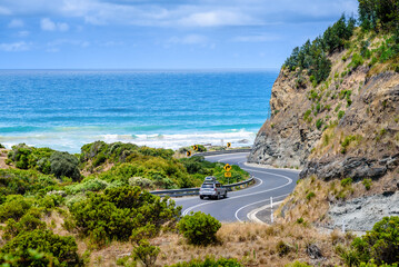 A car driving on the Great Ocean Road in Victoria. View of the coast of Australia.  © Solnechnaja