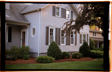 Charming Suburban Home With Well-Kept Garden at Sunset