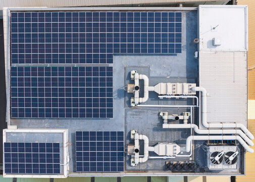 Aerial View of Rooftop Solar Panels and HVAC