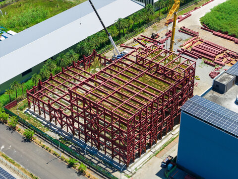 Aerial View of Industrial Construction Site with Steel Framework