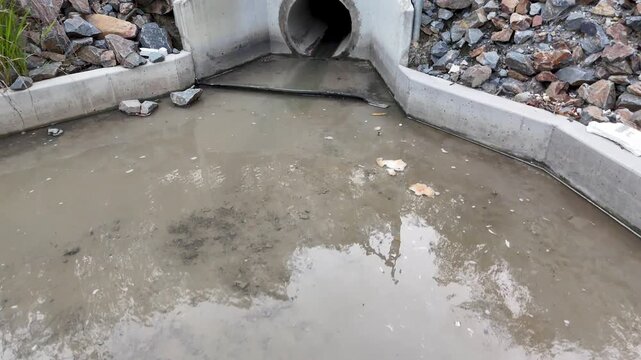 Stormwater Flow from Concrete Drainage Culvert in Gold Coast