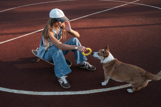Enjoying a sunny afternoon skateboarding with a playful dog 