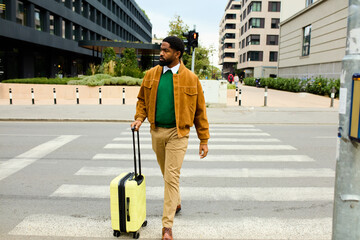 Man with a suitcase crosses the street