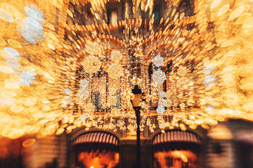 Winter city square aglow with lights