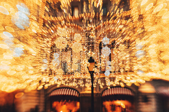 Winter city square aglow with lights