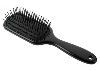 Black paddle hair brush with rounded bristles on a dark background isolated on a transparent background