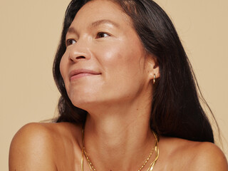 A Woman Exudes Tranquility While Gazing to the Side