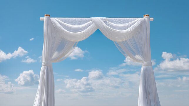 Beautiful beach wedding setup with simple outdoor arch draped in white for a romantic ceremony