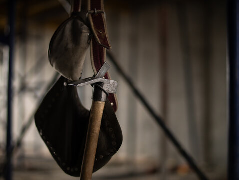 Construction hammer and safety belt hanging on site