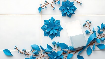 Celebration concept with blue decorative elements on a white wooden background.