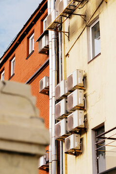 AC Units Mounted on Urban Building Wall