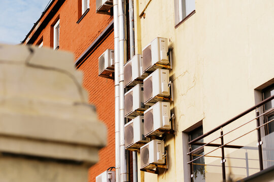 Air Conditioning Units Mounted on Building Exterior in Urban Setting