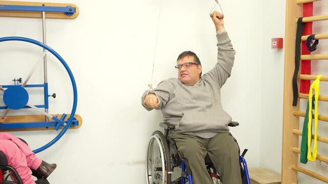 People with a physical disability doing physiotherapy exercises