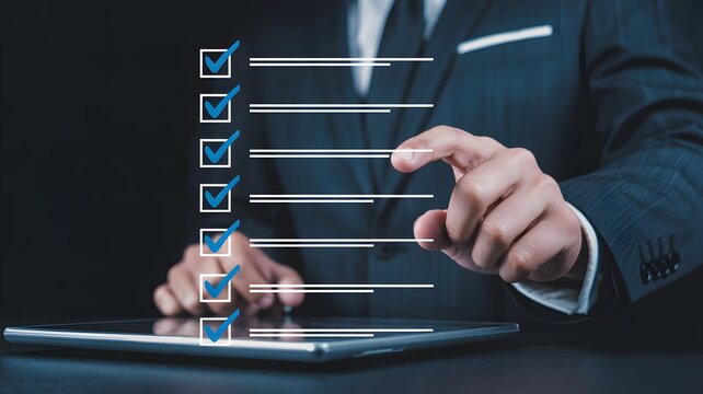 Professional businessman reviewing checklist on tablet for seamless workflow and efficient task management