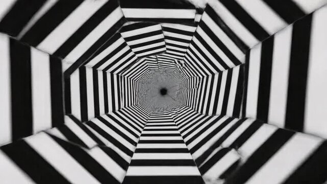 Seamless looping background of repeating black and white hexagonal tiles creating a dizzying kinetic depth illusion repeating black, modern, fractal