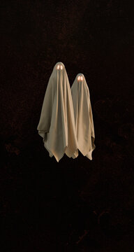 Two Playful Ghosts in a Dark and Spooky Setting