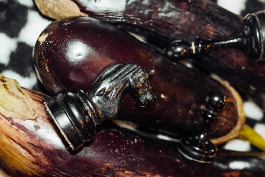 Eggplants with chess pieces