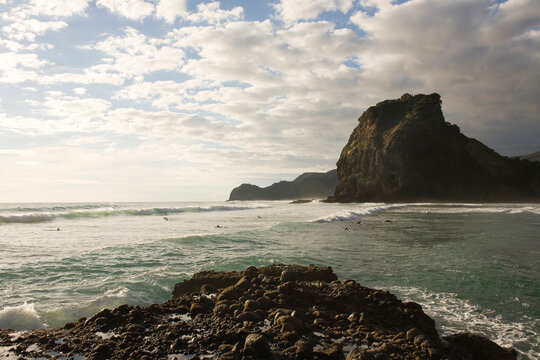 Beach Autumn surfer landscape Piha, New Zealand 