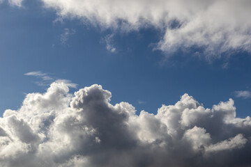 Obraz premium Bright clouds against a blue sky