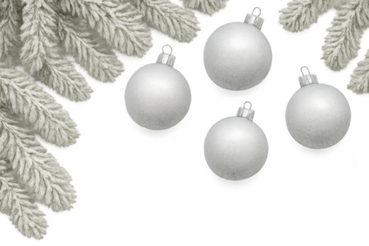 White snowy pine branches with christmas baubles