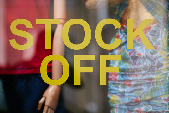 Stock off sale sign on a shop window in Porto