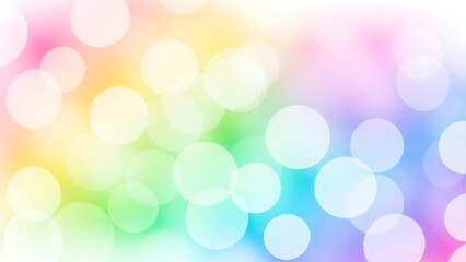 Vibrant rainbow gradient abstract background featuring large soft bokeh circles and bright luminous effects.