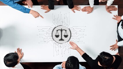 A diverse group of professionals collaborates on a digital justice concept featuring a scale symbol on a table. The scene represents innovation and teamwork in a modern workspace. Raster - Powered by Adobe