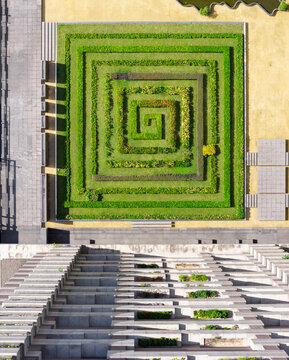 Geometric Spiral Garden and Modern Urban Architecture Aerial Vie