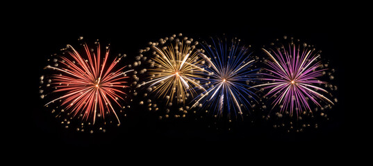 Festive colorful fireworks display isolated on black background for celebration and anniversary