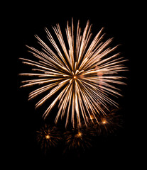 Golden firework sparkling on black background for celebration and anniversary