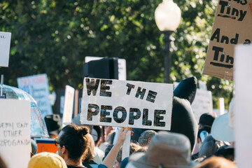 People Marching in City Street Together  Political Protest