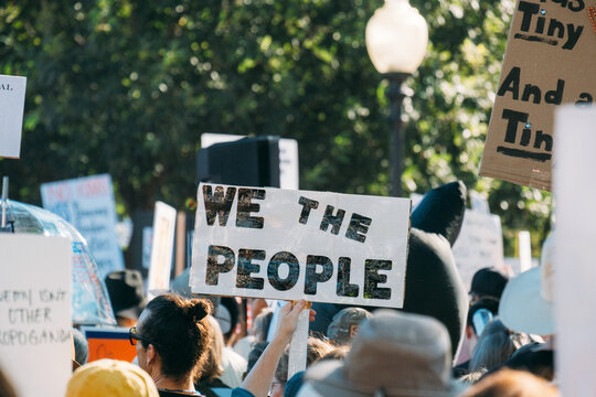 People Marching in City Street Together  Political Protest 