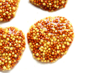 Wholegrain mustard seeds in brine