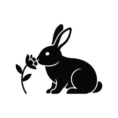 Cute rabbit sniffing spring flower silhouette vector icon