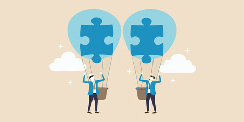 Two businessmen in hot air balloons with puzzle pieces symbolizing teamwork and success