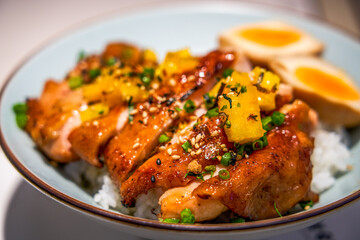 A bowl of delicious and fragrant Japanese teriyaki chicken leg rice