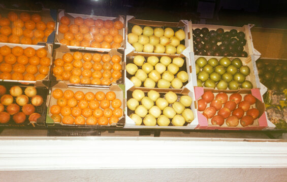 Film image of colorful fruit shop window display