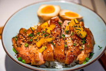 A bowl of delicious and fragrant Japanese teriyaki chicken leg rice