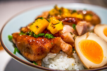 A bowl of delicious and fragrant Japanese teriyaki chicken leg rice