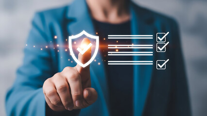 Businesswoman securing data with digital shield and checklist for compliance