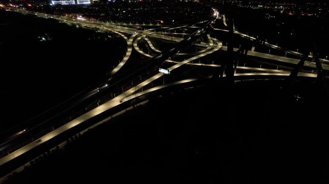 Night Highway Overpass Interchange - Aerial Urban Traffic Infrastructure
