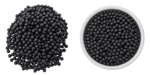Pile of black caviar next to white bowl filled with black caviar isolated on a transparent background