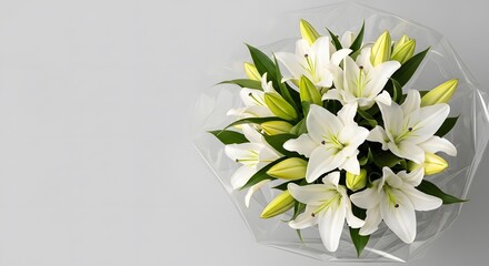 Elegant bouquet of white lilies with greenery on a light background
