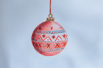 Children's drawing of a Christmas tree ball in pencil.